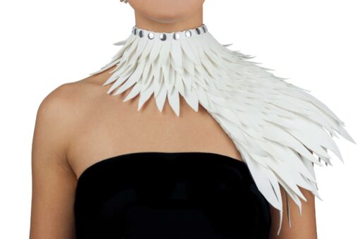 One-shoulder collar, with short feathers in inner tube, lined with fabric, studded corset fastening